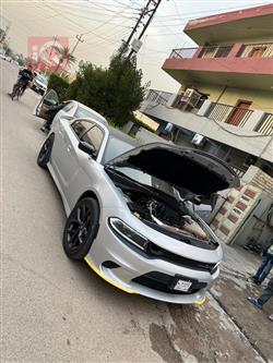 دۆج چارجەر